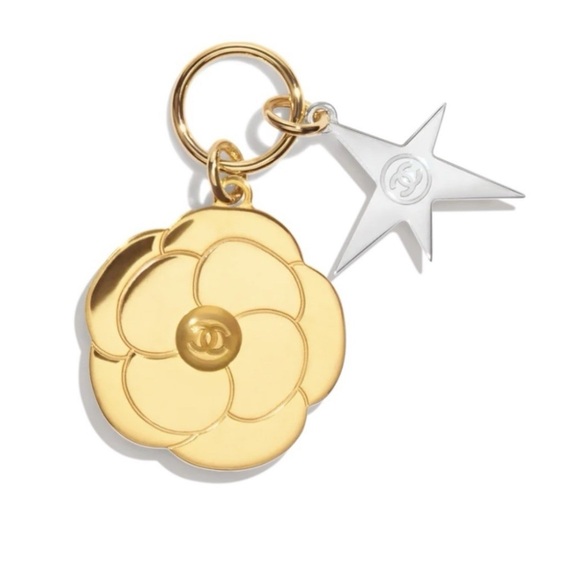 CHANEL Accessories - Chanel gold camellia flower with silver star charm